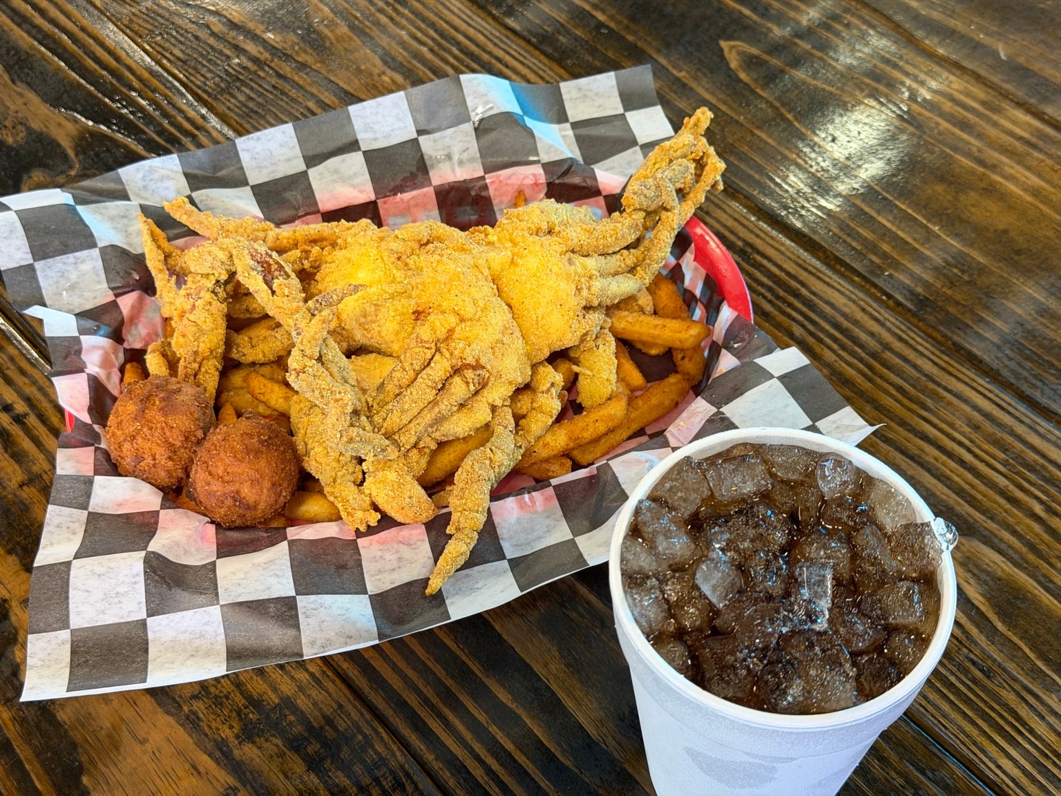 Fried softshell crab basket with fries and hush puppies